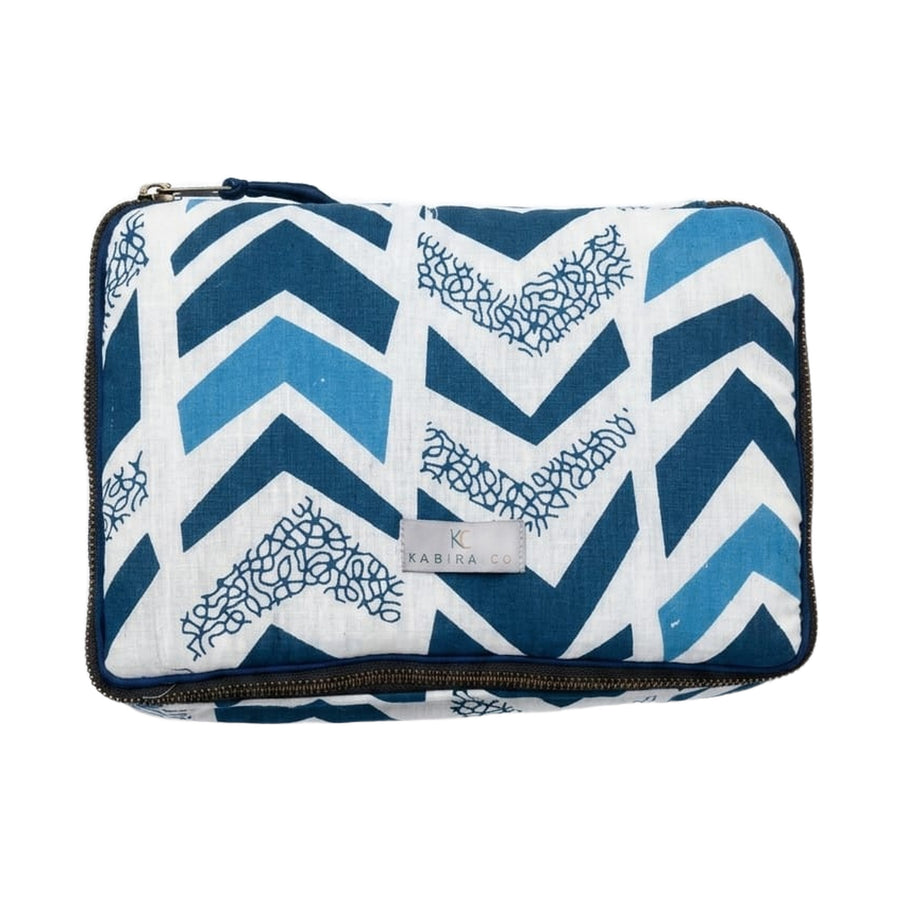 Kabira hand block printed quilted travel pouch in indigo chevron with corded zip